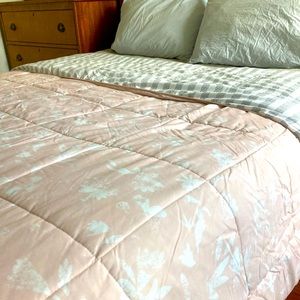 Full / queen comforter and sham. Reversible pink floral and grey/white stripes.